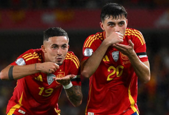 西班牙队再胜一仗,锁定淘汰赛资格 西班牙队再胜一仗,锁定淘汰赛资格